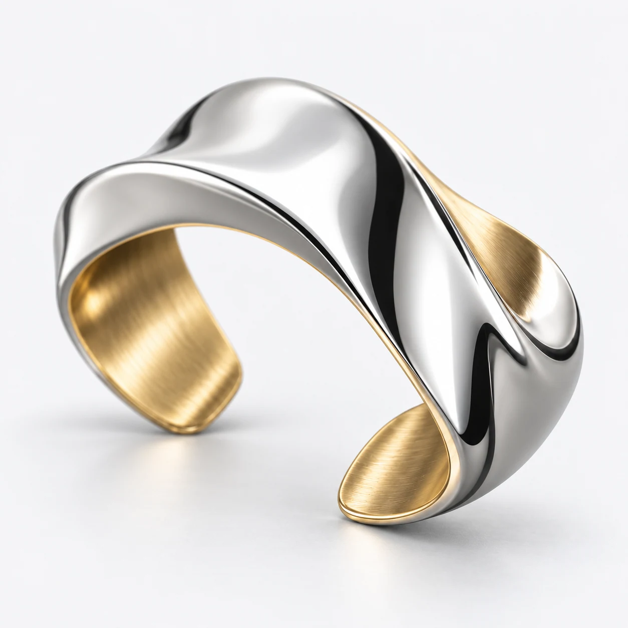 Polished silver fold and brushed gold lining — surface detail study